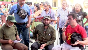 Member of the National Assembly Braulio Alvarez. peasant leader Jose Pimentel and Gabriel Gil feeding ministry office in a press conference in Caracas on May 25